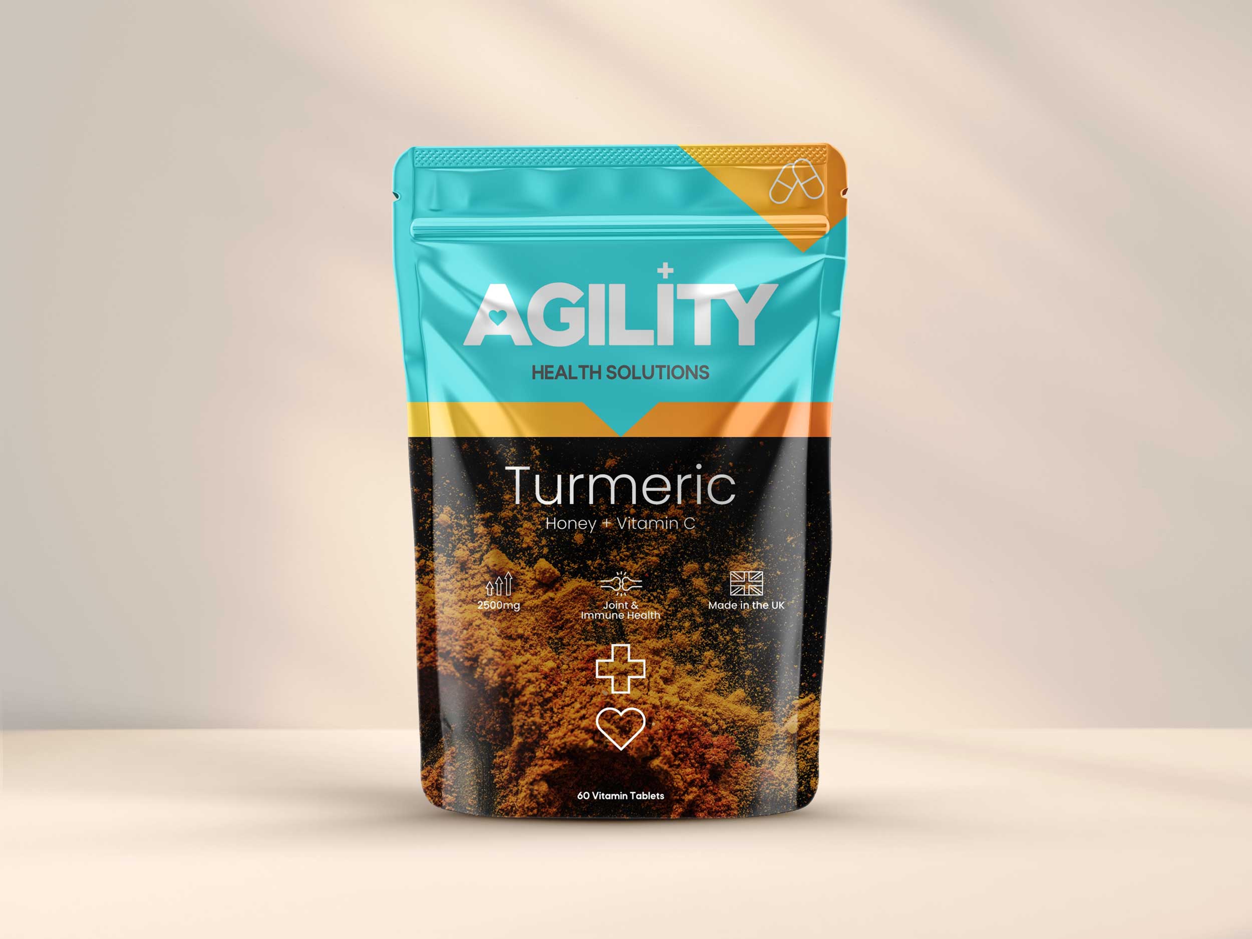 This image features a package of Agility Health Solutions Turmeric 2500mg tablets, which are intended for dietary use. The packaging is vibrant, with a striking blue and orange color scheme that highlights the product name and the key ingredients: turmeric, honey, and vitamin C.