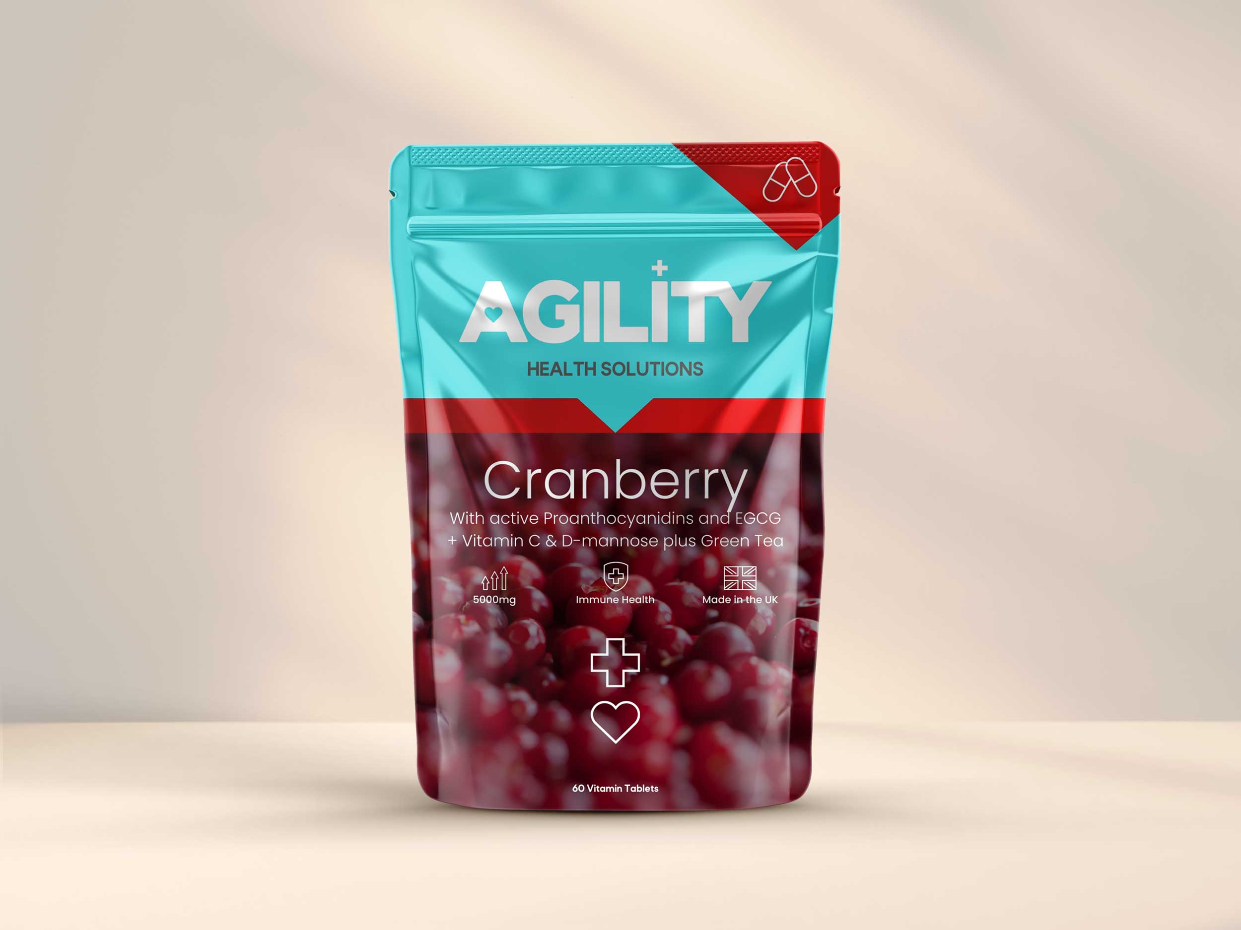 A package of Agility Health cranberry tablets with a red and blue color scheme and an image of cranberries on the front.