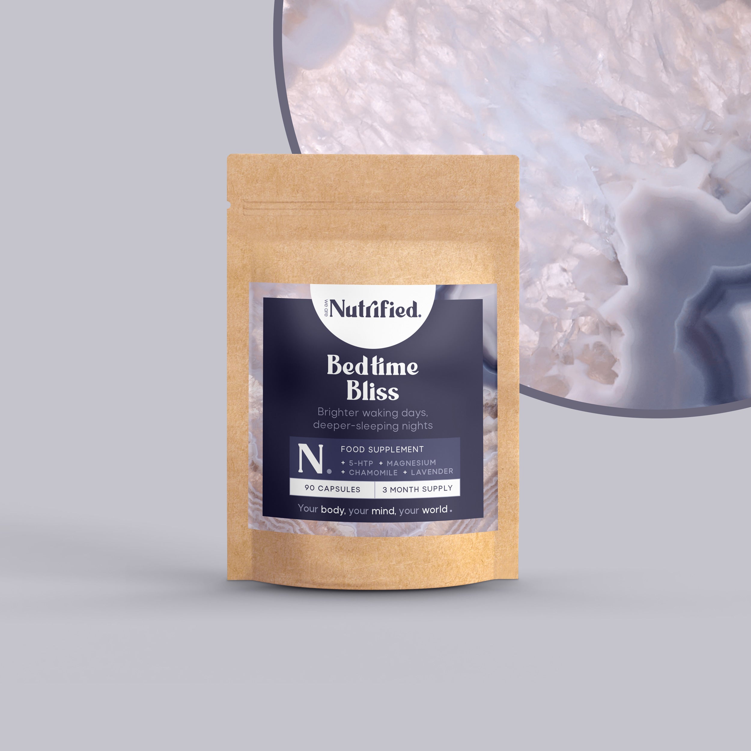 A package of a Bedtime Bliss supplement with a background of a crystal lamp, suggesting a calming effect.